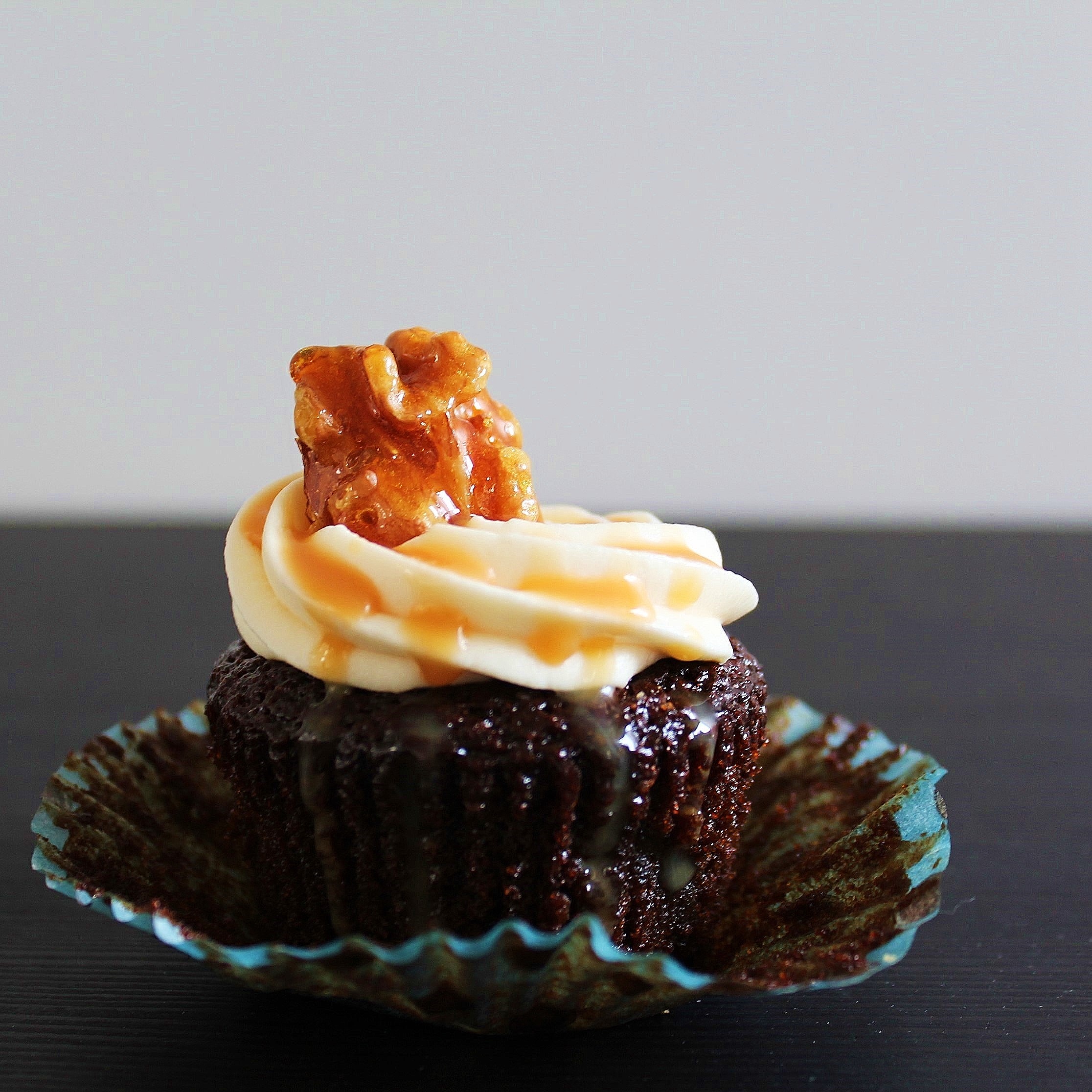 A gingerbread cupcake drizzled with salted caramel