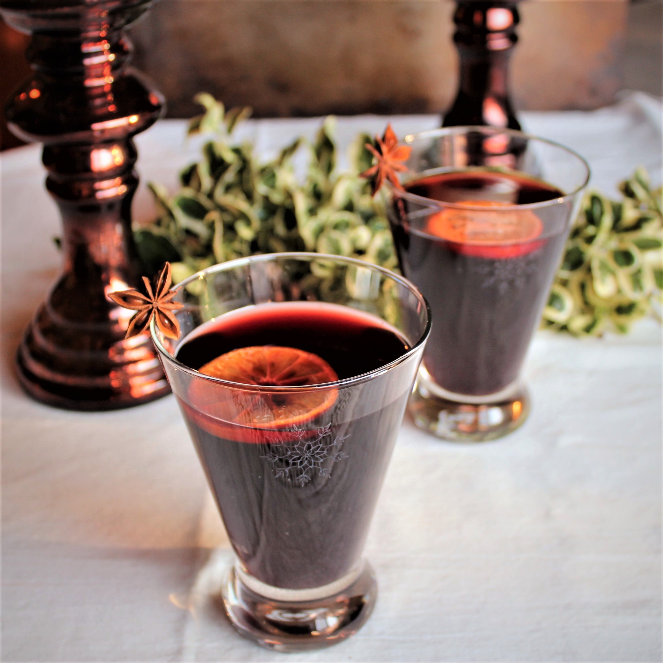 Two glasses of warm, mulled wine