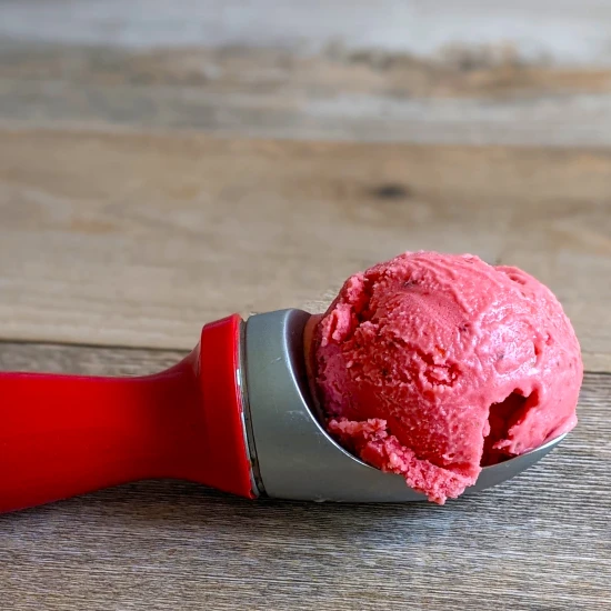 A scoop of homemade Strawberry Rose Frozen Yogurt
